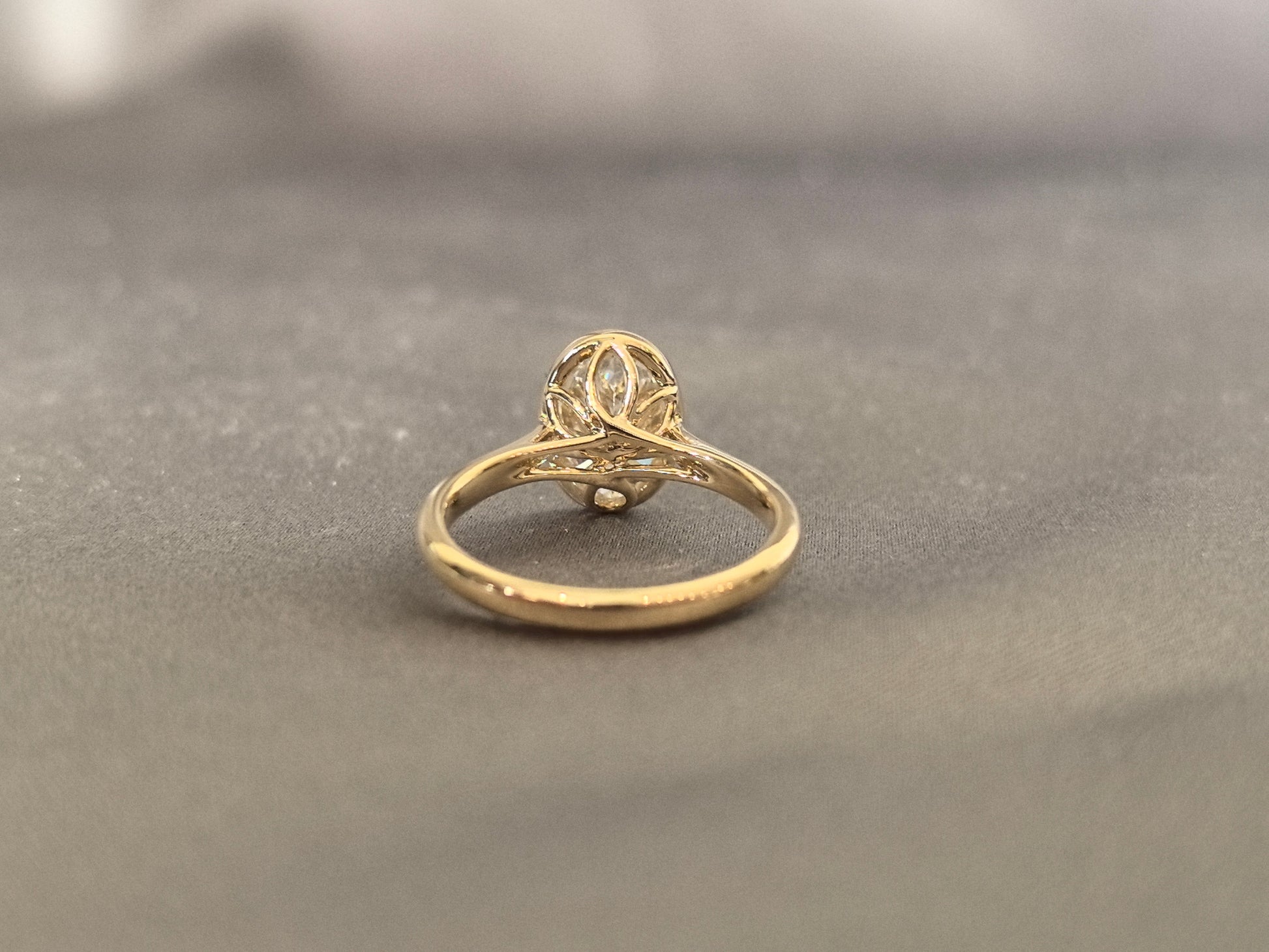 Oval-cut lab diamond solitaire ring - Bezel-set - Low-profile oval diamond