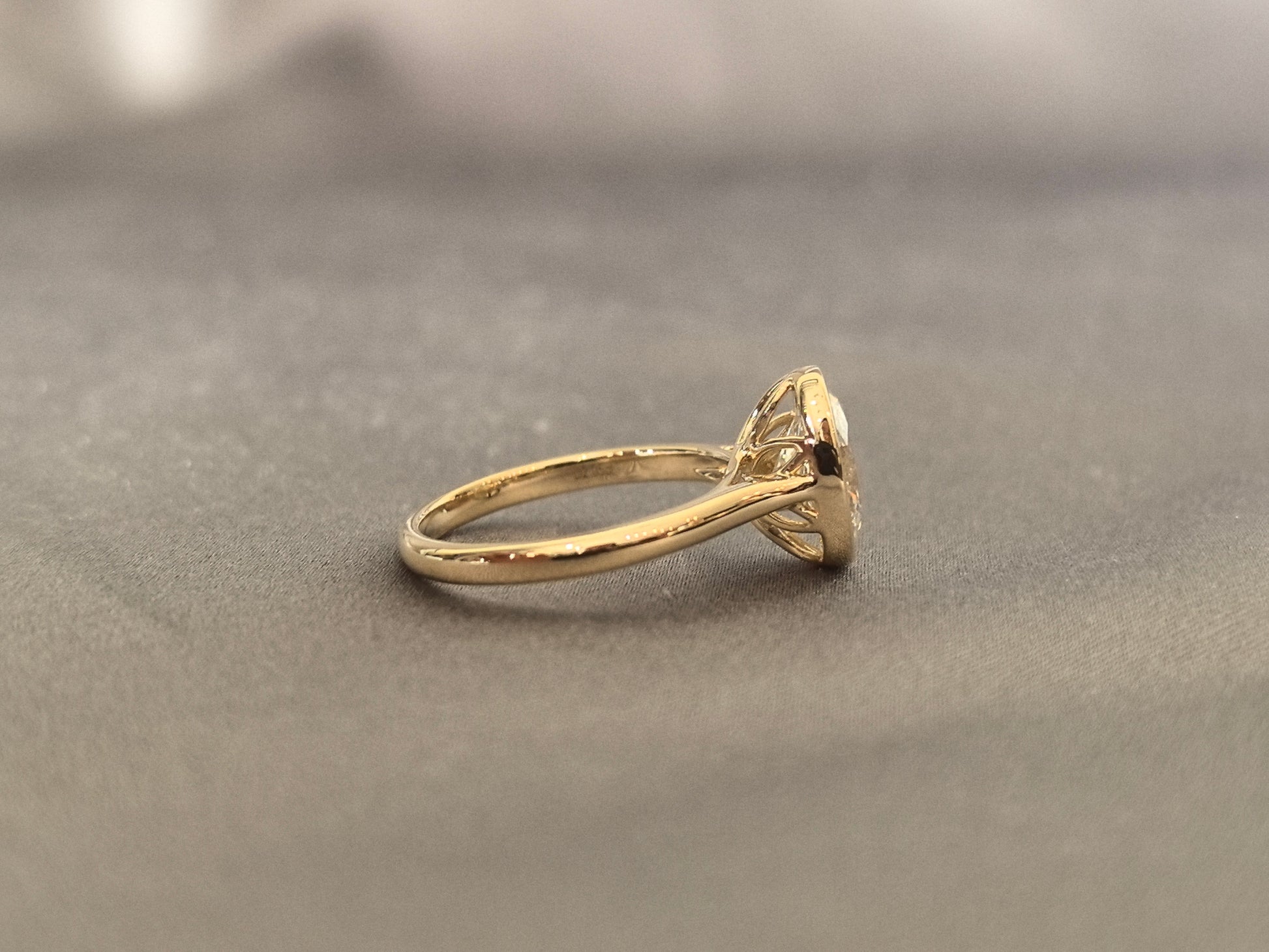 Oval-cut lab diamond solitaire ring - Bezel-set - Low-profile oval diamond