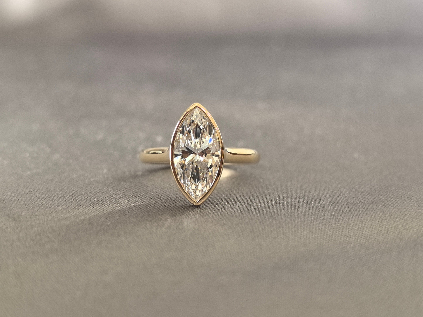 Marquise-cut lab diamond solitaire ring - Bezel-set - Streamlined modern silhouette