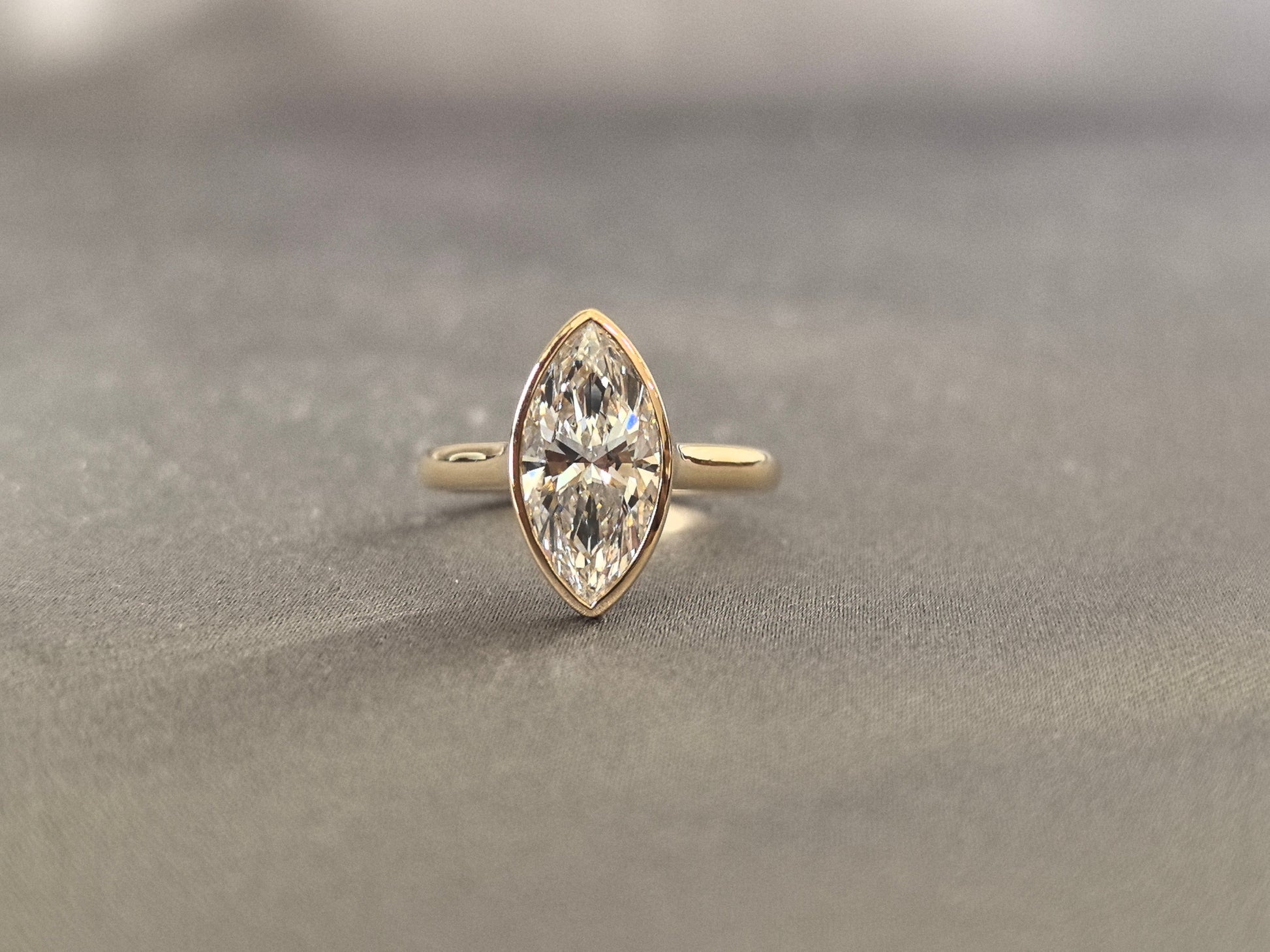 Marquise-cut lab diamond solitaire ring - Bezel-set - Streamlined modern silhouette