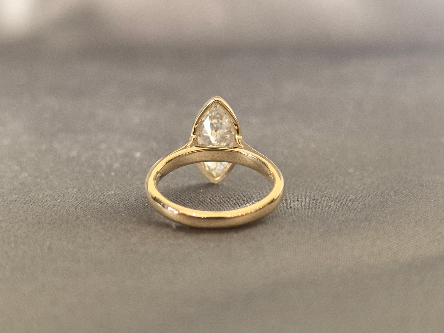Marquise-cut lab diamond solitaire ring - Bezel-set - Streamlined modern silhouette