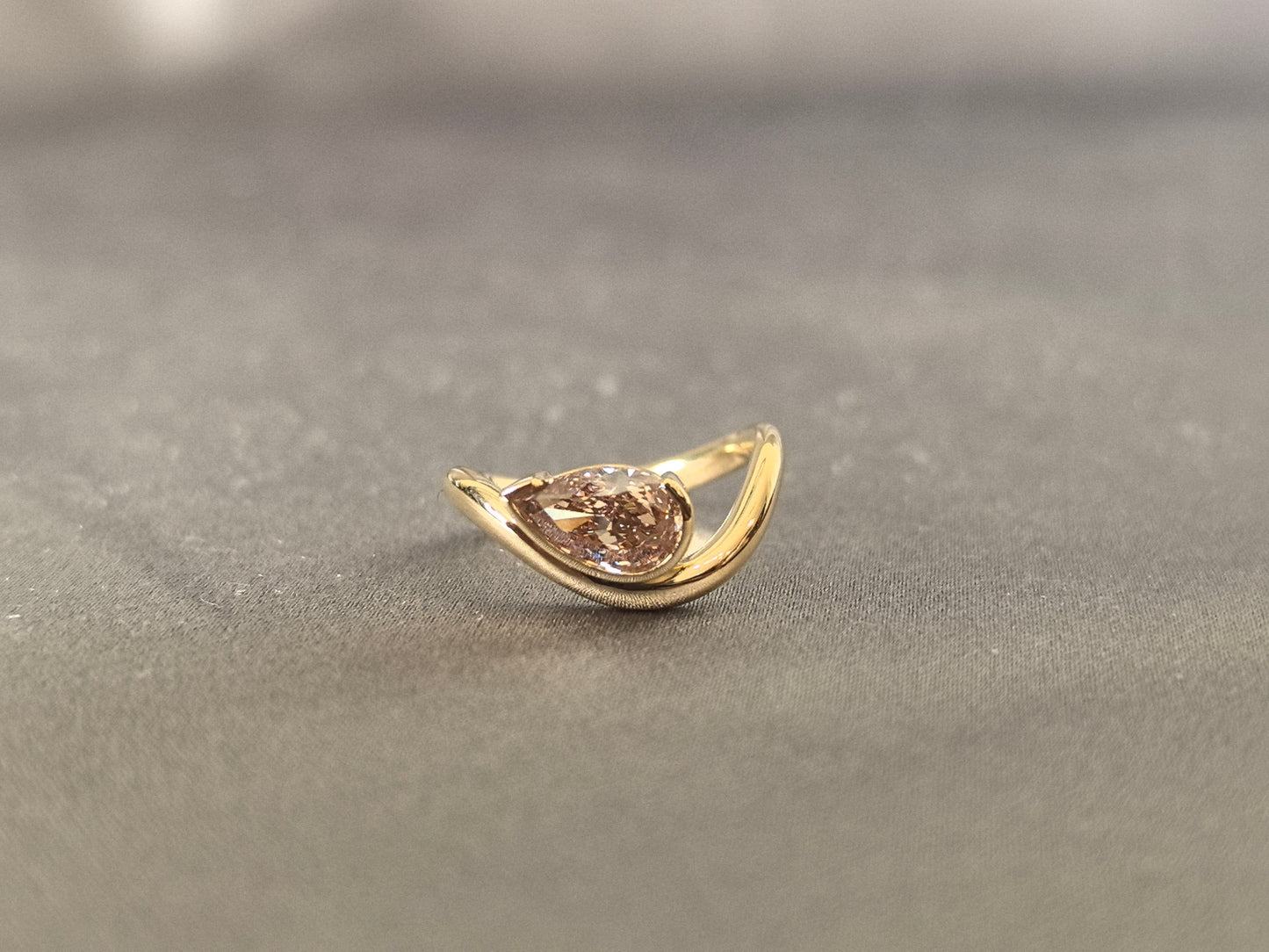 Brilliant pear-cut champagne diamond - Bezel-set pink diamond ring - Sculptural modern silhouette
