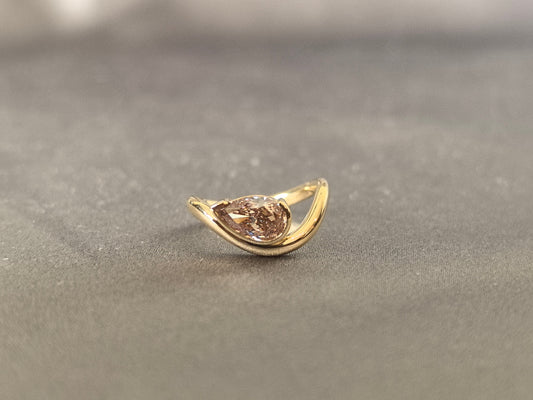 Brilliant pear-cut champagne diamond - Bezel-set pink diamond ring - Sculptural modern silhouette