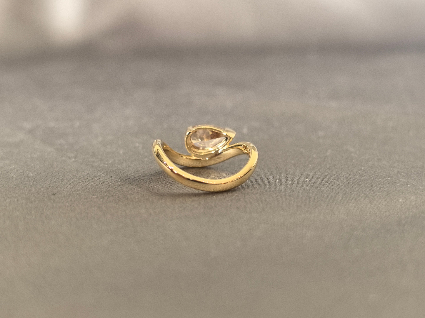 Brilliant pear-cut champagne diamond - Bezel-set pink diamond ring - Sculptural modern silhouette