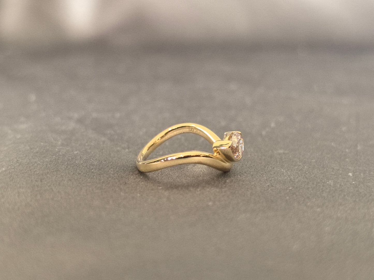 Brilliant pear-cut champagne diamond - Bezel-set pink diamond ring - Sculptural modern silhouette