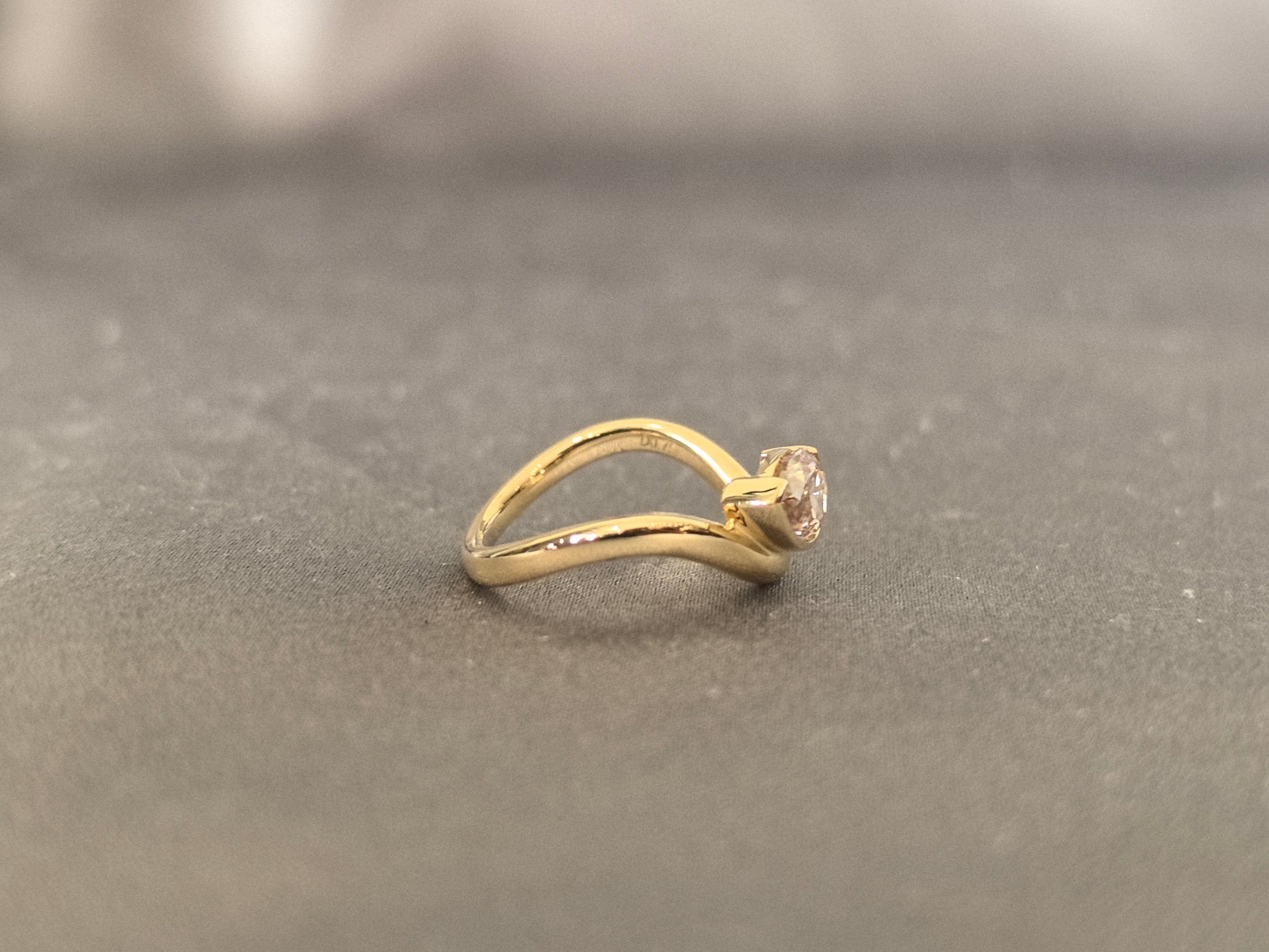 Brilliant pear-cut champagne diamond - Bezel-set pink diamond ring - Sculptural modern silhouette