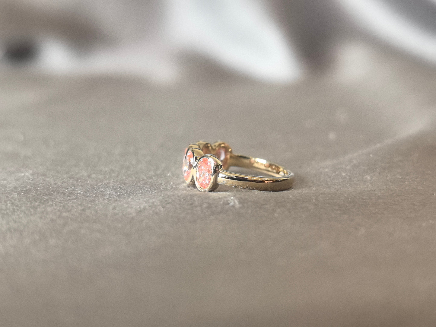 Oval-cut pink lab diamond half eternity ring - Bezel-set champagne diamond wedding band - Scratch-resistant setting