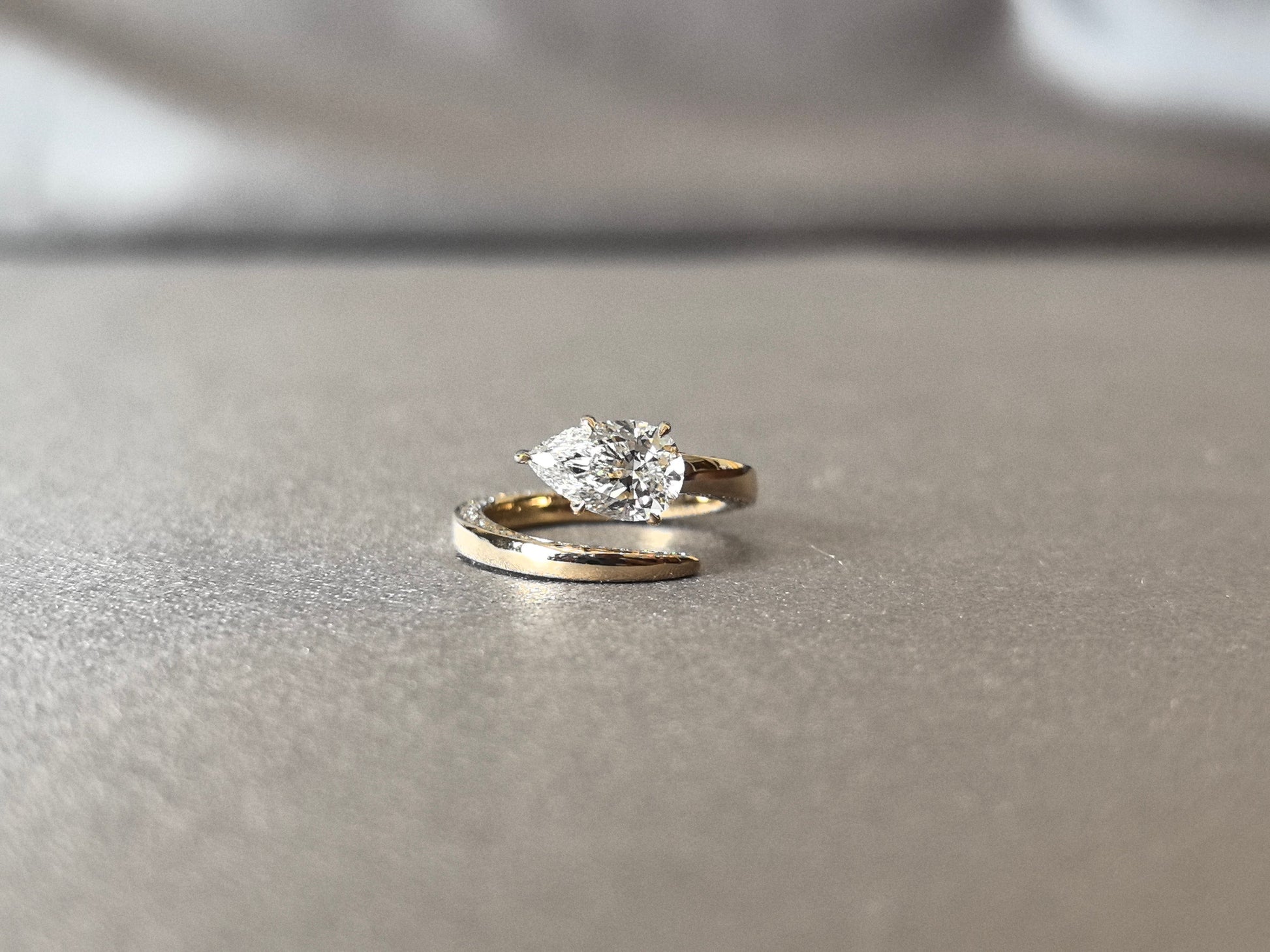 Pear-Cut Lab-Grown Diamond Bypass Solitaire Ring - Secure Prong-Set Pear-Cut & Pave Diamonds - Modern Bypass
