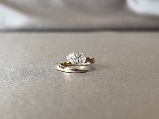 Pear-Cut Lab-Grown Diamond Bypass Solitaire Ring - Secure Prong-Set Pear-Cut & Pave Diamonds - Modern Bypass