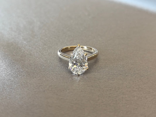 Pear-Shaped Diamond Solitaire Engagement Ring - Prong-Set - Delicate Milgrain Detailing