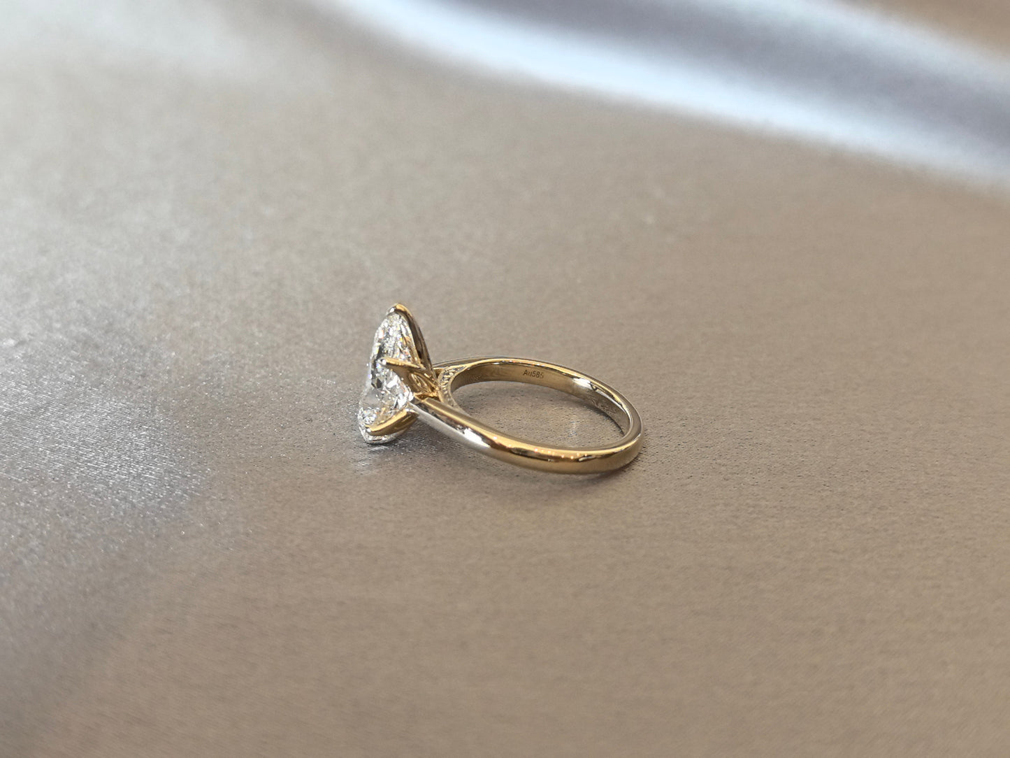 Pear-Shaped Diamond Solitaire Engagement Ring - Prong-Set - Delicate Milgrain Detailing