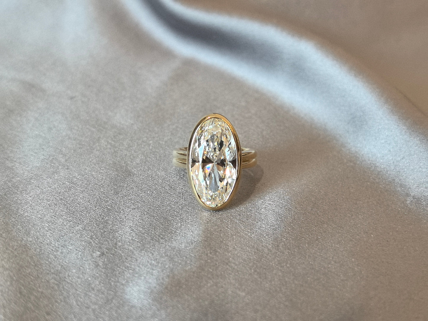 Marquise-Cut Diamond Solitaire Ring - Bezel-Set - Split-Shank Band