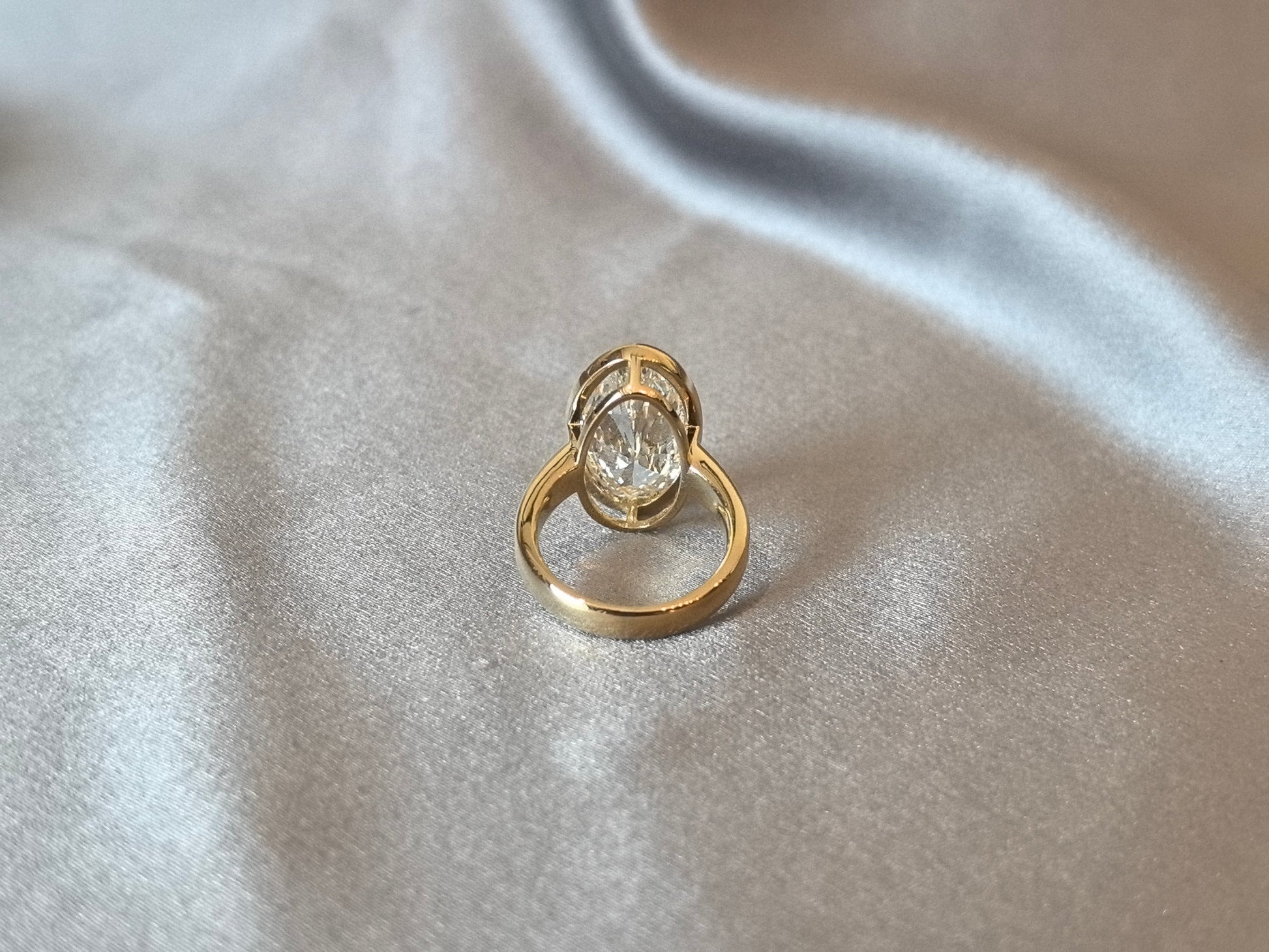 Marquise-Cut Diamond Solitaire Ring - Bezel-Set - Split-Shank Band