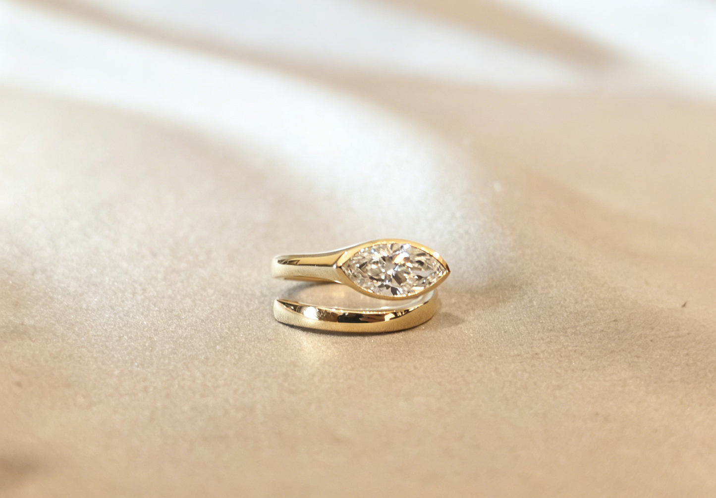 Marquise-cut lab diamond open bypass ring - Bezel Set - Open bypass wrap-around design